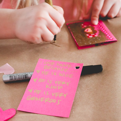 coloring the front of a valentine's day card