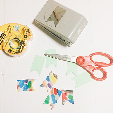 scissors, tape, and a paper punch
