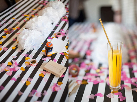 table with heart confetti and a mimosa