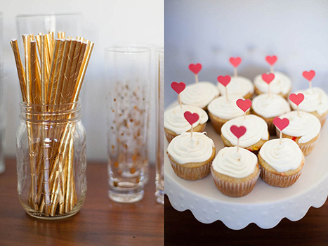 gold straws and cupcakes with heart shaped flags on them