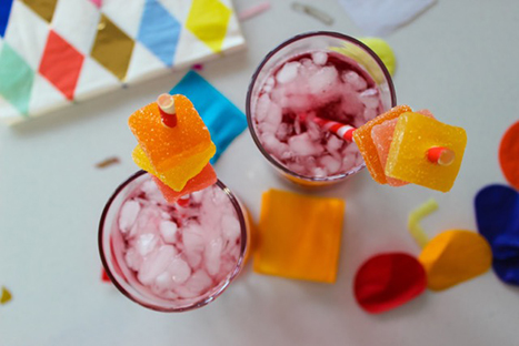 Shirley Temples in Paper Source 'You're the Best' glasses topped with gummy straws