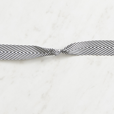 black and white ribbon double knotted