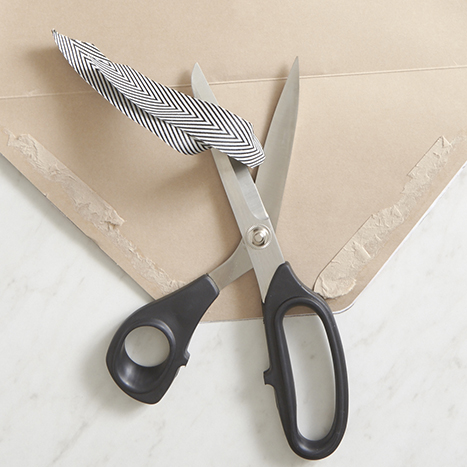 scissors trimming ribbon