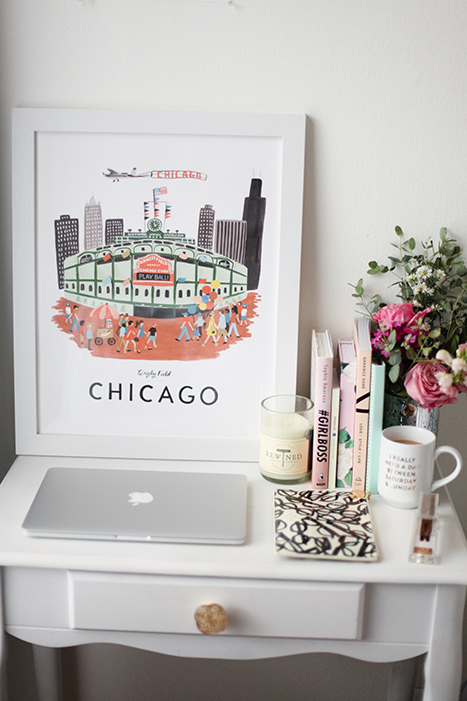 framed print of Chicago on a desk