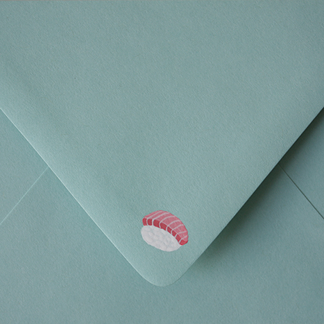 sushi drawn on blue envelope